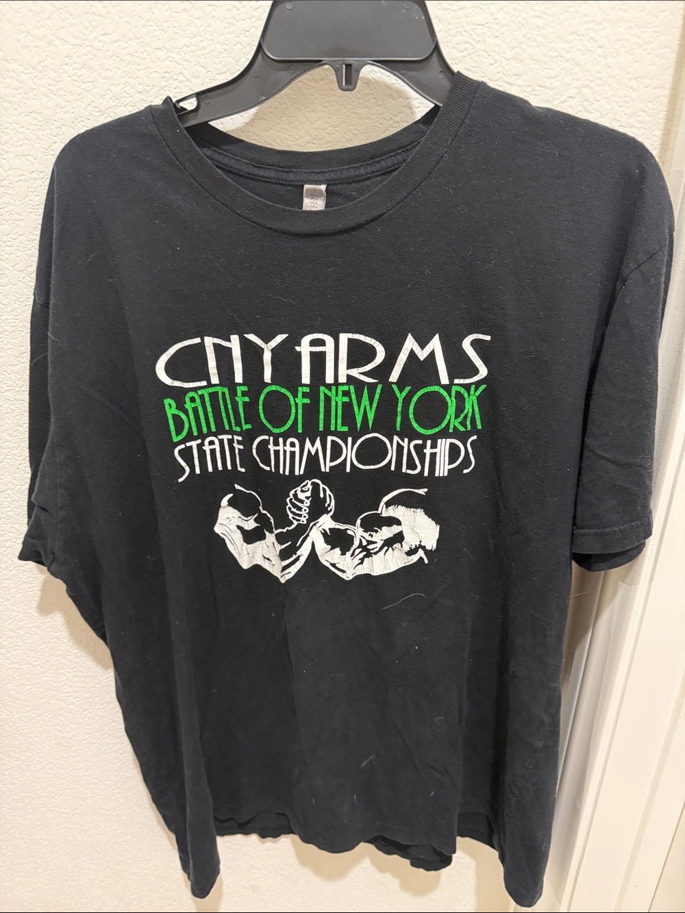 Next Level Apparel Black Tee with White and Green 'Battle of New York' Graphic